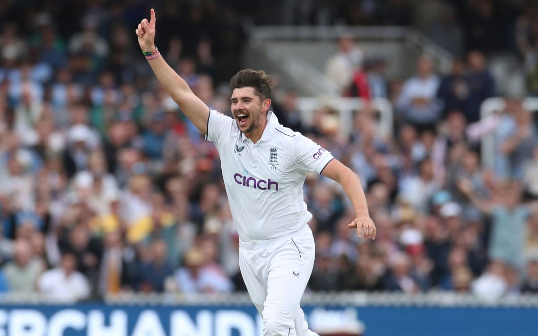 Josh Tongue of England celebrates