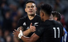 Sonny Bill Williams (L) celebrates with try scorer Julian Savea during the international rugby test match between New Zealand and Samoa at Eden Park in Auckland on June 16, 2017.