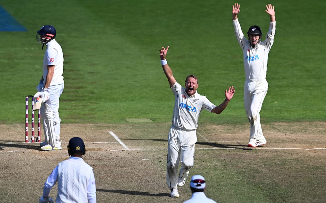 Neil Wagner of New Zealand appeals successfully as James Anderson of England is caught behind by Tom Blundell and New Zealand beat England at the Basin Reserve, 2023.