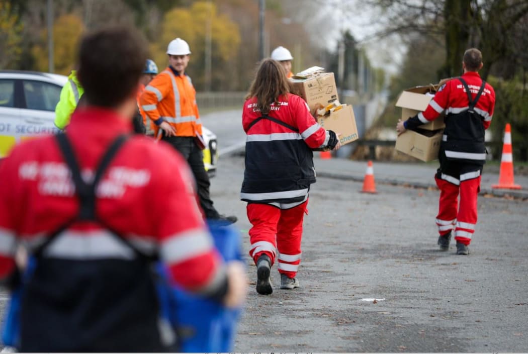 NZ Rescue passing supplies over Ashburton bridge