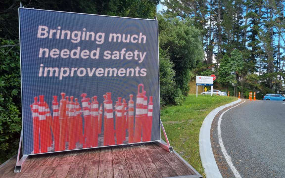 Mystery surrounds tongue in cheek digital billboard placed by an intersection where Waka Kotahi has recently finished work. Junction Road and State Highway 3.