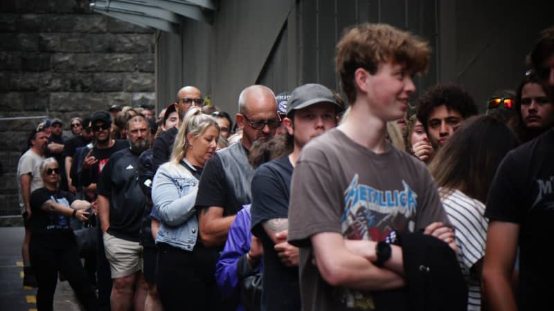 Metallica fans queue to buy merchandise in central Auckland before the band's gig at Eden Park.