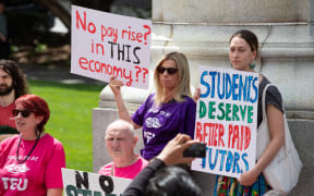 Members of the Tertiary Education Union protest outside Parliament