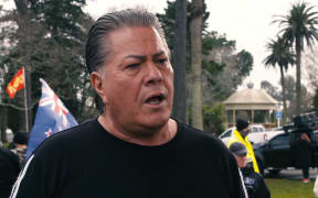 Destiny Church leader Brian Tamaki speaks at one of the anti-mandate protests at the Auckland Domain.