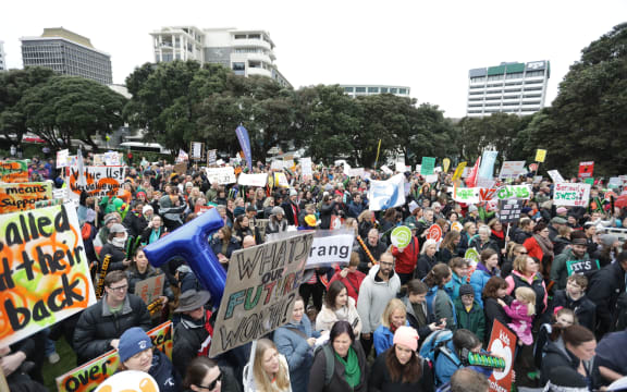 The teachers' strike march reaches Parliament.