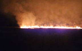 Fire burns through northern Waikato wetlands.