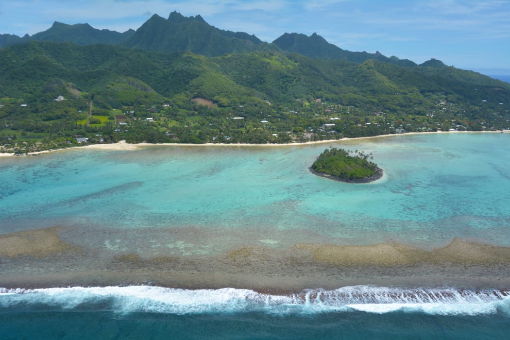 Aerial landscape view of the beautiful Muri Lagoon and a Motu (Islet) in Rarotonga Island in the Cook Islands.