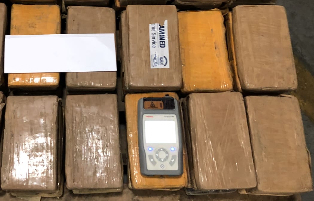 Packages of seized cocaine found in a shipping container from South America.