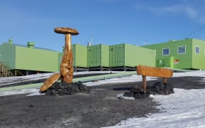 Scott Base is a series of interlinked buildings, and is painted a distinctive shade of green, Resene Chelsea Cucumber.