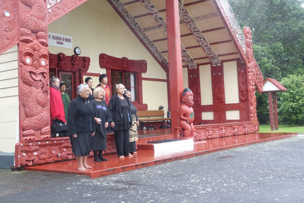 Waitara kuia call the official party onto Owae Marae