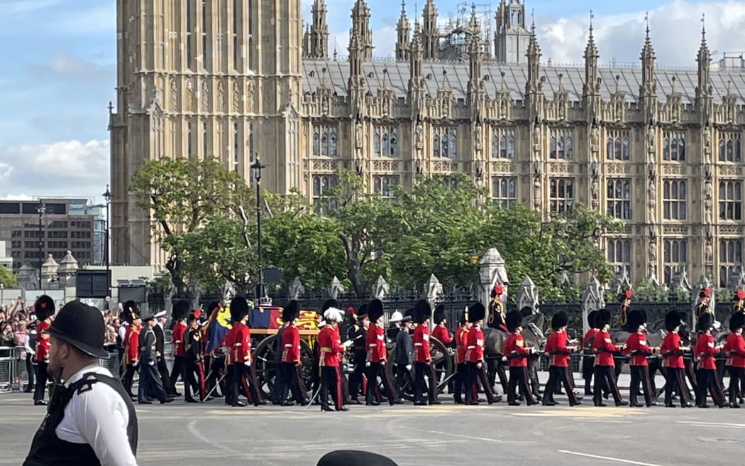 The procession leaves Westminster Hall.