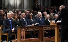 Trump, Melania Trump, Barack Obama, Michelle Obama, Bill Clinton, Hillary Clinton and Jimmy Carter listen as former Sen. Alan Simpson, R-WY., speaks during a State Funeral Funeral former US President George H.W. Bush.