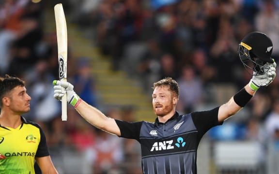 Martin Guptill celebrates his century.