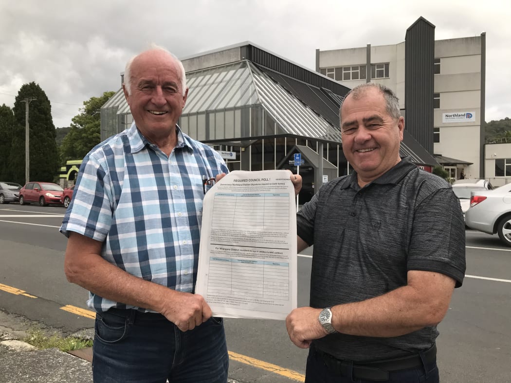 Democracy Northland campaigners John Bain (left) and Robin Grieve (right) are spearheading New Zealand's biggest Māori wards opposition polling demand campaign outside Northland Regional Council's head office in Whangārei.