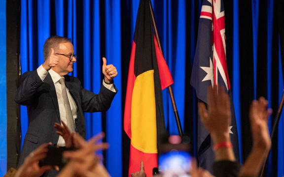 Australian Labor Party leader Anthony Albanese celebrates as he walks off the stage in Sydney on election night after winning the 2022 general election.