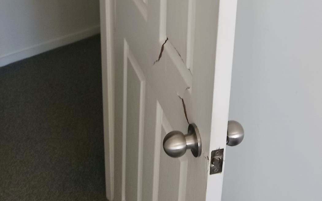 Binh Hoang says the robbers left behind a 'mess' of broken locks and damage, including to his bedroom door.