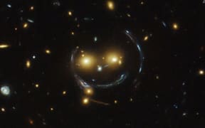 The heavens smile on us ... the galaxy cluster, SDSS J1038+4849.