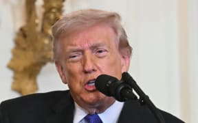 US President Donald Trump speaks during a Medal of Honor ceremony in the East Room of the White House on March 2, 2026, in Washington, DC. President Trump awarded the Medal of Honor to retired Army Command Sgt. Major Terry P. Richardson, who served in the Vietnam War, posthumously to Army Master Sgt. Roderick W. Edmonds, who served in World War II, and posthumously to Staff Sgt. Michael Ollis, who died in combat in Afghanistan in 2013. (Photo by SAUL LOEB / AFP)