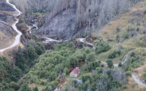 A historic hut on Coronet Peak was not damaged during a large vegetation fire on the Skippers Road.