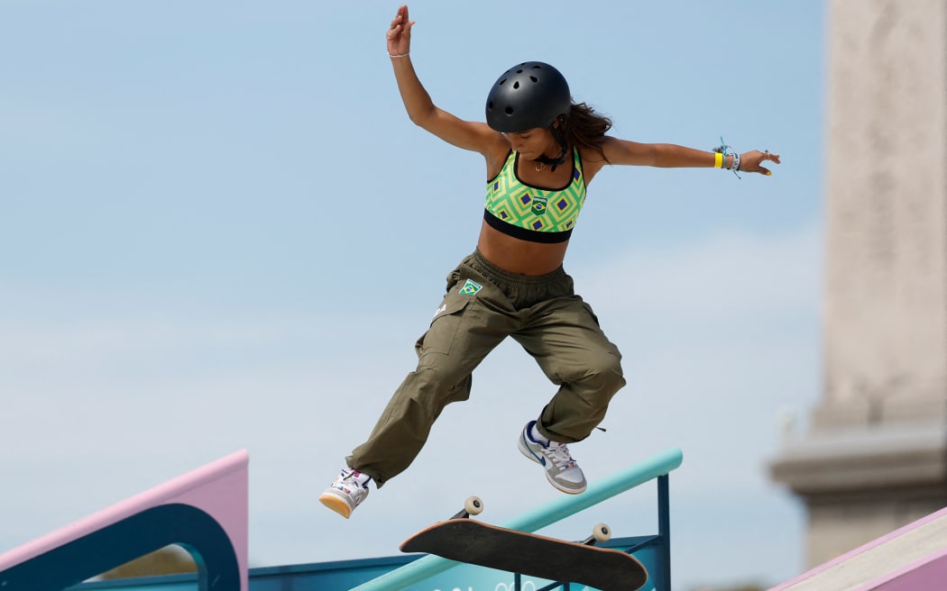 Brazil's Rayssa Leal competes in the women's street skateboarding prelims wearing Nike SB Dunks.