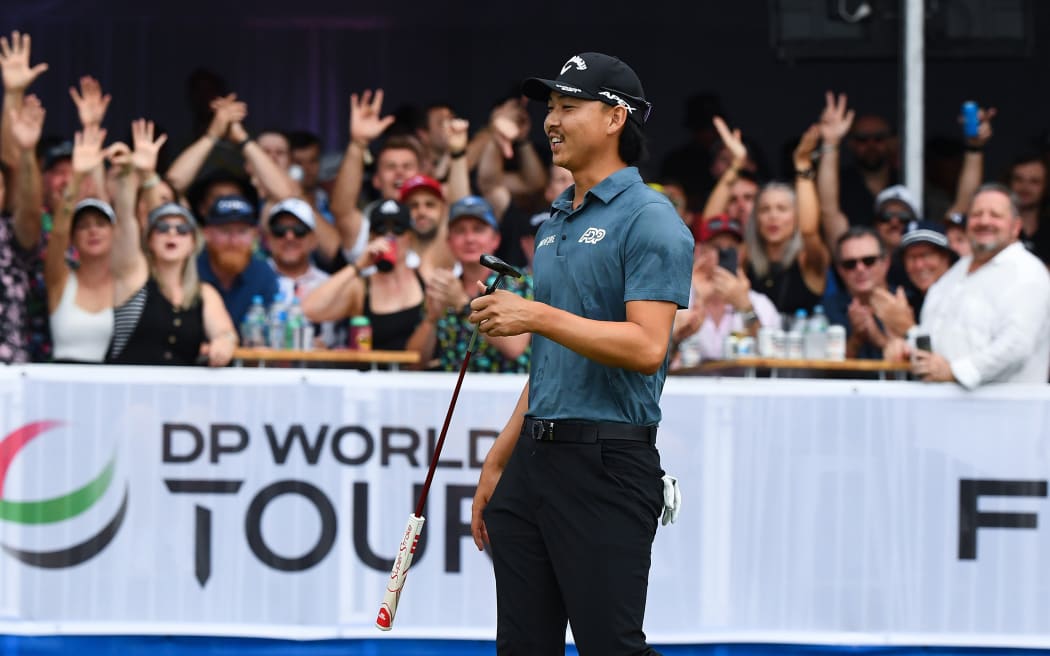 Champion Min Woo Lee gets a reaction from the crowd during the Australian PGA Championship in Brisbane.