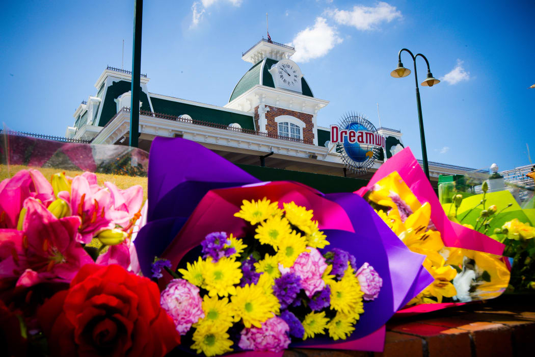Flowers outside Dreamworld in Queensland, where four people died.