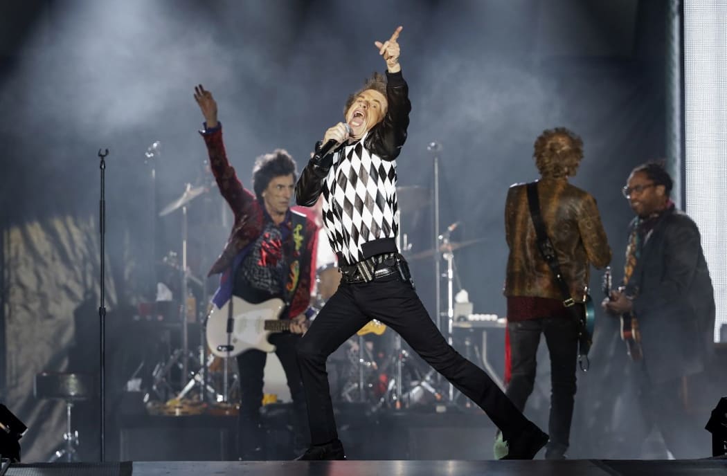 Ronnie Wood (L), Mick Jagger (C), Charlie Watts (partially hidden) and Keith Richards of the Rolling Stones perform as they resume their "No Filter Tour" North American Tour at the Soldier Field on June 21, 2019 in Chicago.