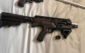 A number of firearms have been seized following a search warrant at a Henderson property.