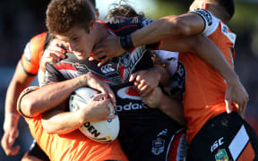 Blake Ayshford carries the defence.