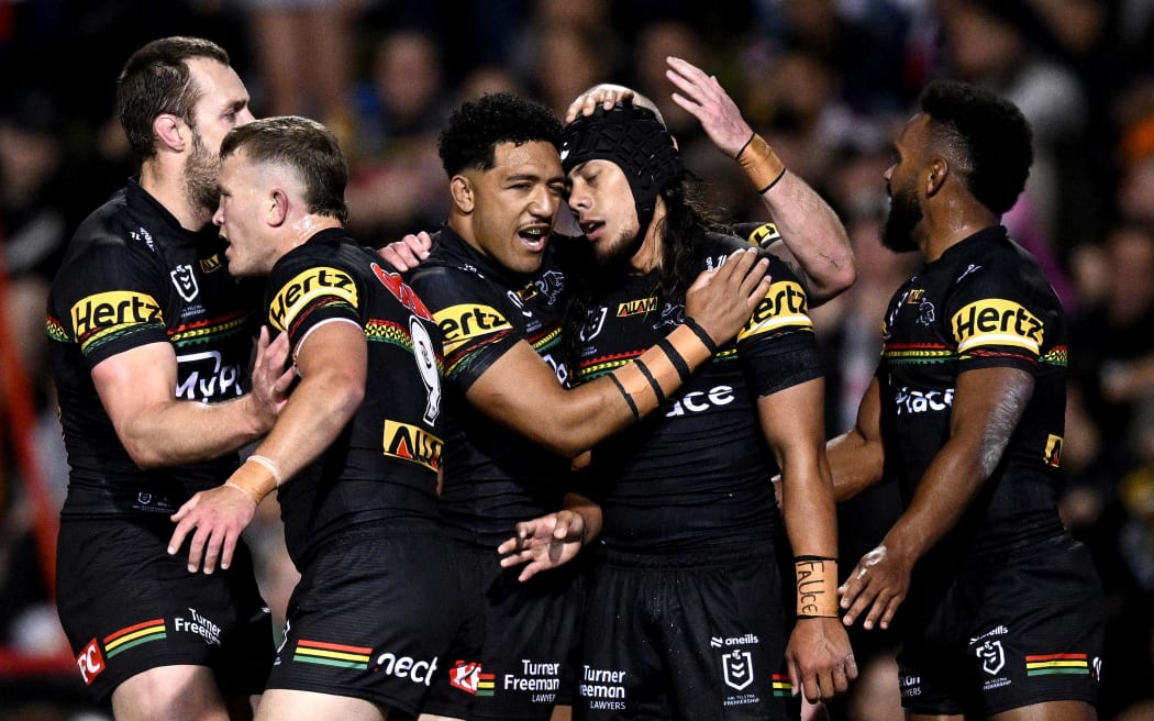 Jarome Luai of the Panthers (second right) celebrates with teammates after scoring a try during the NRL Qualifying Final match between the Penrith Panthers and the Sydney Roosters at BlueBet Stadium on 13 September, 2024.