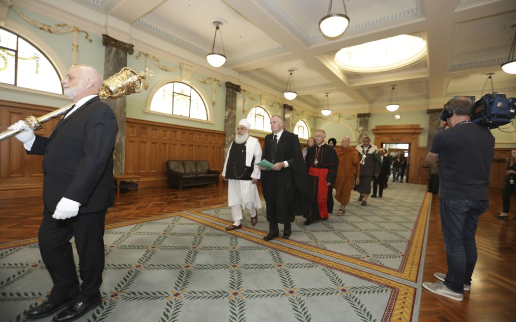 Imam Nizam ul haq Thanvi and Trevor Mallard lead a multi-faith procession into The House.