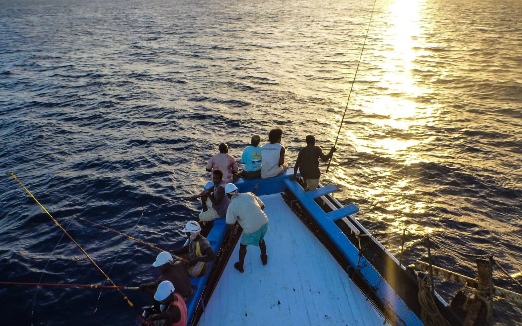 Getting ready for the first set of the day on a pole and liner near Noro in the Solomon Islands.