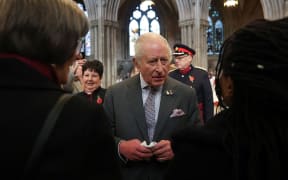 LICHFIELD, STAFFORDSHIRE - OCTOBER 27: King Charles III meets community groups during his visit to Lichfield Cathedral, with a focus on the Fenland Black Oak Table, The Table for the Nation on October 27, 2025 in Lichfield, Staffordshire. (Photo by Temilade Adelaja - WPA Pool/Getty Images)