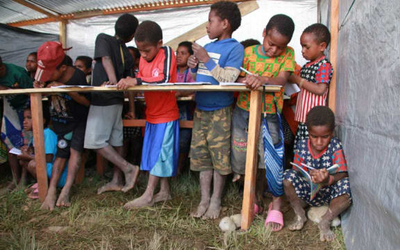 Emergency temporary school for displaced Papuan children in Wamena.