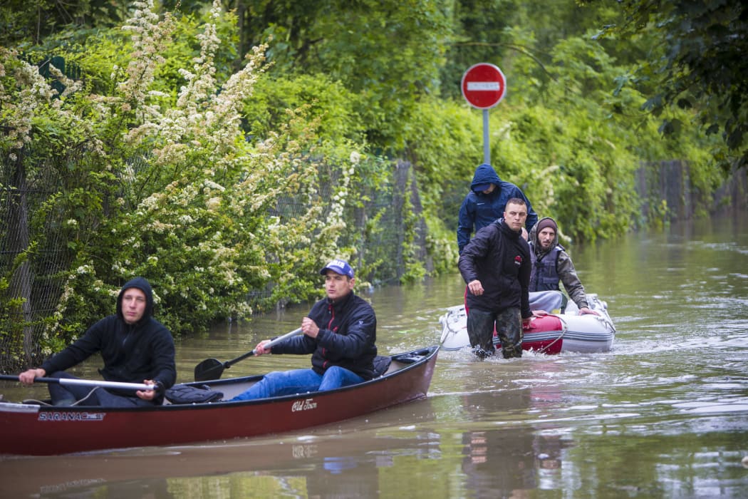 Firemen aided by municipal services attempt to evacuate since two days all homes by boat. Montgeron, Crosnes, Yerres and Brunoy are among the towns and villages affected by the floods.