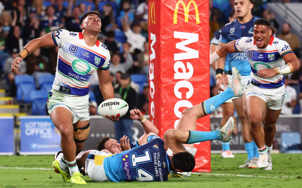 Eddie Ieremia-Toeava of the Warriors celebrates scoring a try against Gold Coast Titans.