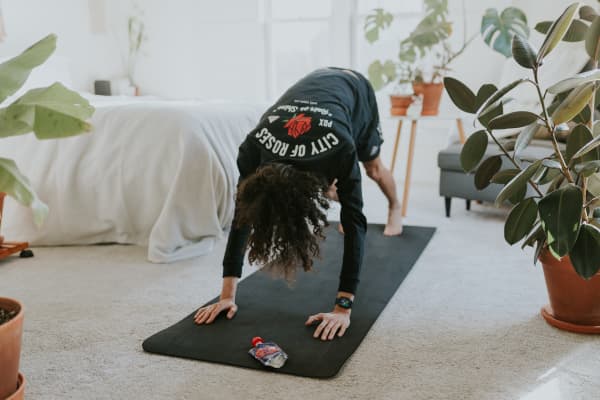 A person exercising at home.
