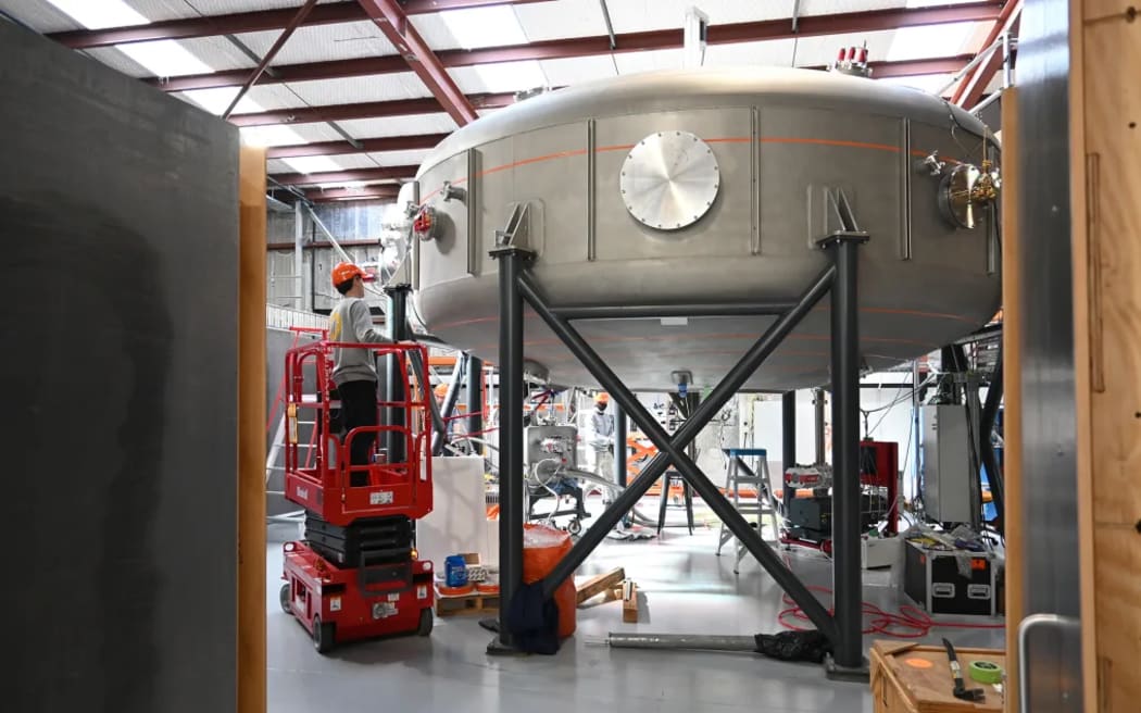 The fusion reactor looks like a steel donut on legs and is housed in a warehouse in Wellington, New Zealand.