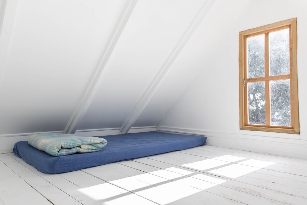 A bed set up ready for people in need of emergency housing at the Island Child Charitable Trust