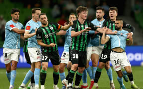 Players jostle during the A-League semi-final between Melbourne City and Western United.