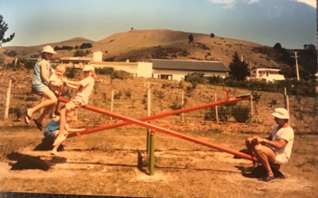 Bek Thomas at a park in the South Island with her family in the summer of 1988.