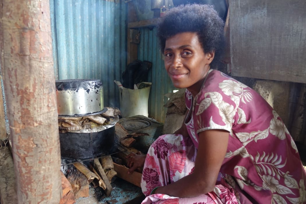 A Nawaisomo woman cooking. Food is the biggest problem now according to the village chief.