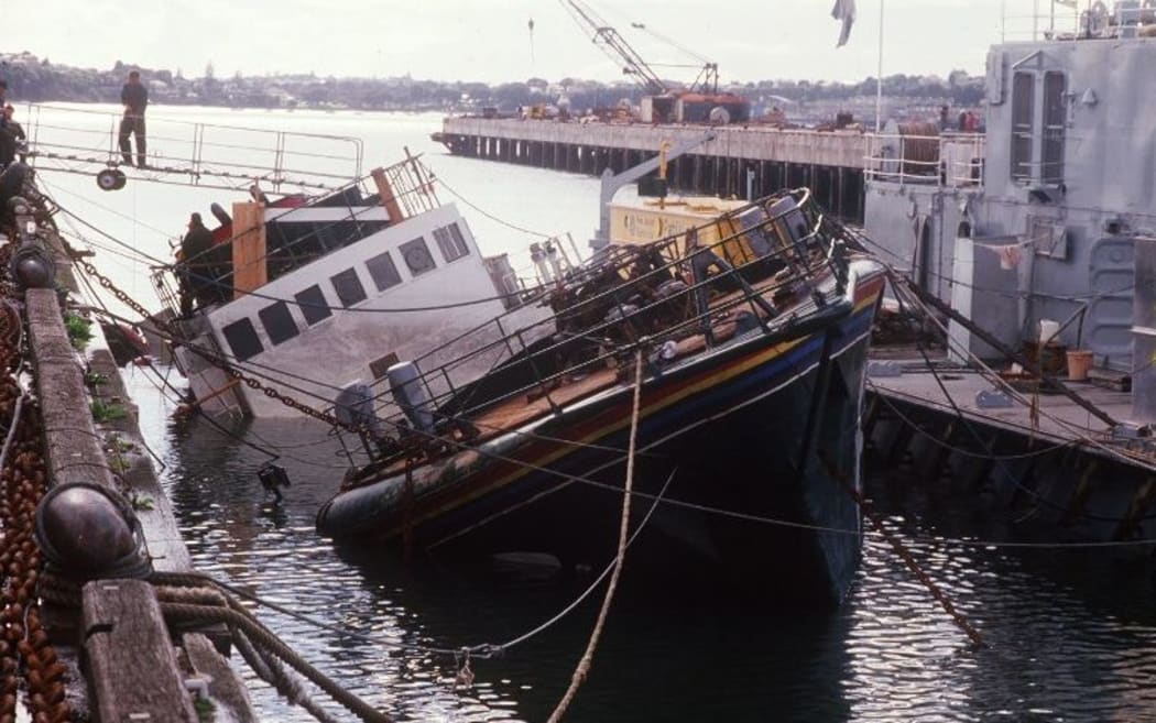 French spies detonated two mines attached to the side of the Rainbow Warrior, as it sat in dock at Auckland's Marsden Wharf in July 1985.