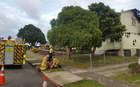The damage from the suspected arson at a house at the centre of the Porirua siege.
