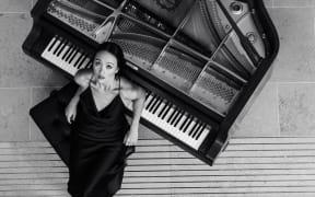 New Zealand pianist, Somi Kim with piano