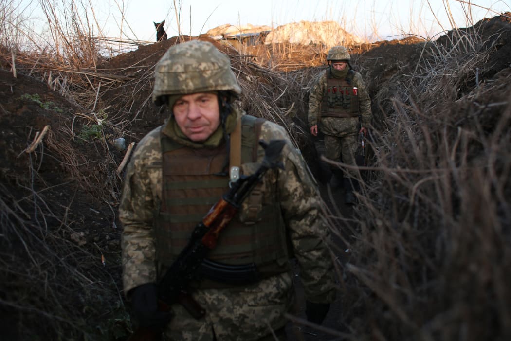 Ukrainian soldiers on the front line with Russia backed separatists, near Novognativka village, Donetsk region on 21 February 2022.