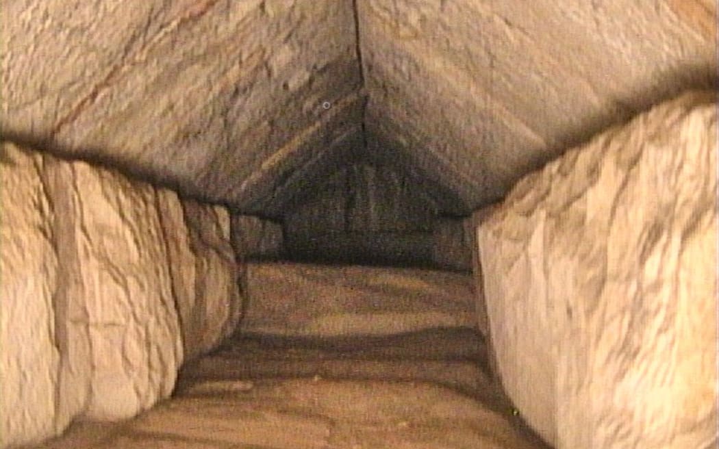 This handout picture taken on January 24, 2023 and released by the Egyptian Ministry of Antiquities on March 2, 2023 shows a hidden passage inside Egypt's Great Pyramid, at the ancient site in Giza also known as the Khufu. - Scientists have discovered a hidden passage inside Egypt's Great Pyramid, the authorities announced on March 2, 2023, part of a seven-year international research project. The passage is nine metres (30 feet) in length and more than two metres in width, the antiquities ministry said in a statement. (Photo by Egyptian Ministry of Antiquities / AFP) / === RESTRICTED TO EDITORIAL USE - MANDATORY CREDIT "AFP PHOTO / HO / EGYPTIAN MINISTRY OF ANTIQUITIES- NO MARKETING NO ADVERTISING CAMPAIGNS - DISTRIBUTED AS A SERVICE TO CLIENTS ==