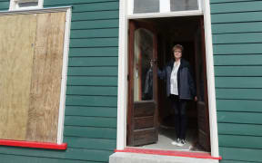 Christchurch Heritage Trust chair Anna Crighton stands in the doorway of the historic Shands building