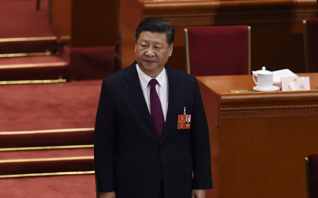 Chinese President Xi Jinping arrives for the opening session of the National People's Congress, China's legislature, in Beijing's Great Hall of the People on March 5, 2018.