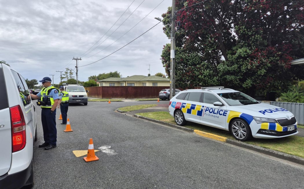 Police breathtesting drivers in the Napier suburb of Maraenui on 12 December 2024.